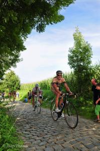 Cyclists struggling to keep up with the pack